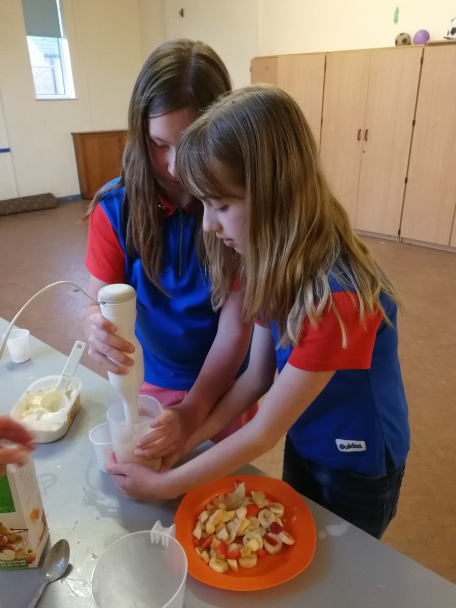 Guides perfect their cooking skills